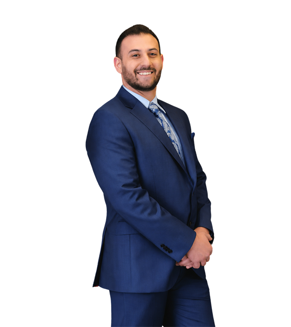 Thomas Spiro Conits, Greenville personal injury attorney, in a blue suit
