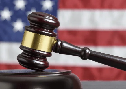 Judges gavel and American flag